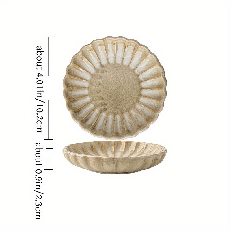 Two square yellow retro-style petal-shaped condiment dishes