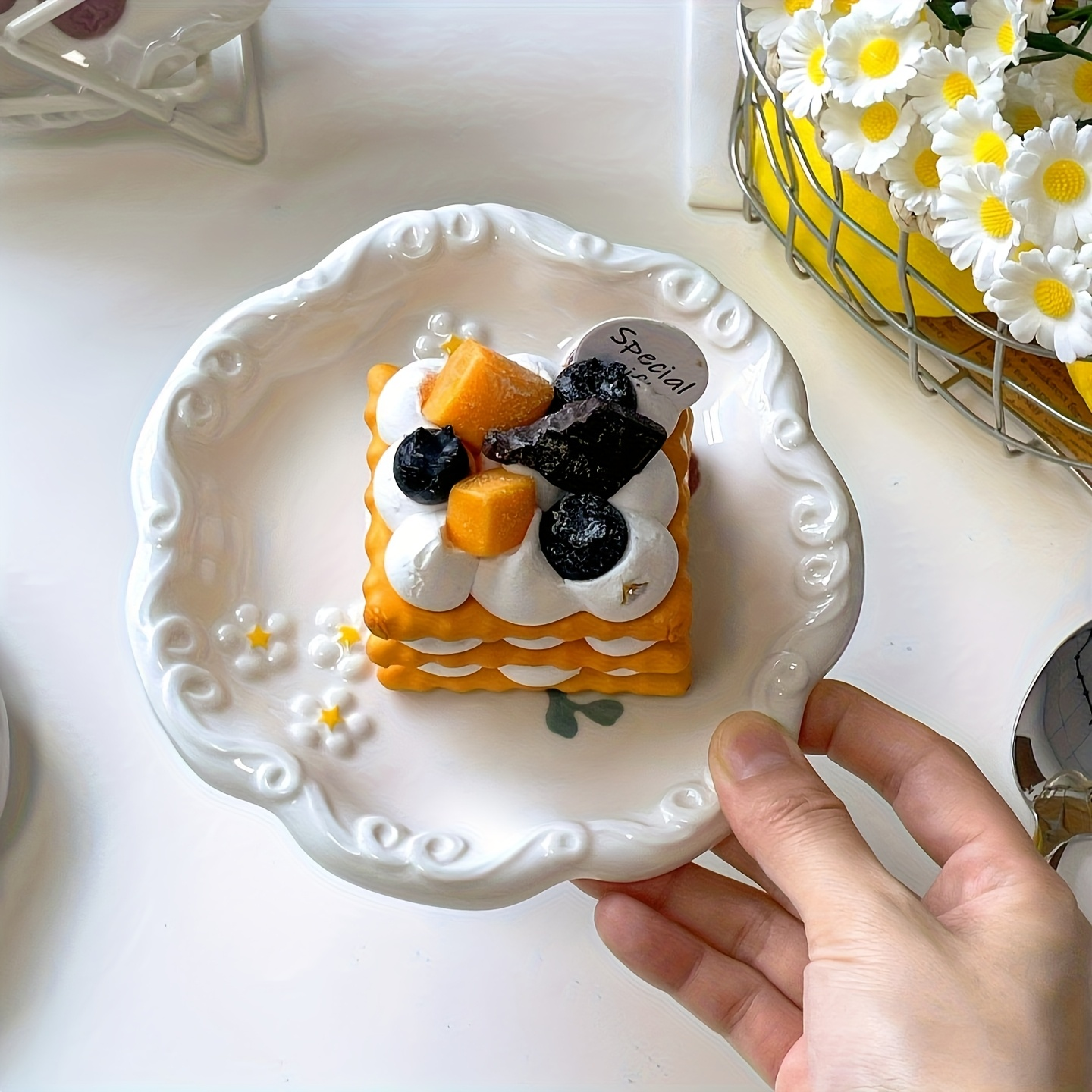 Two-piece ceramic embossed plate set