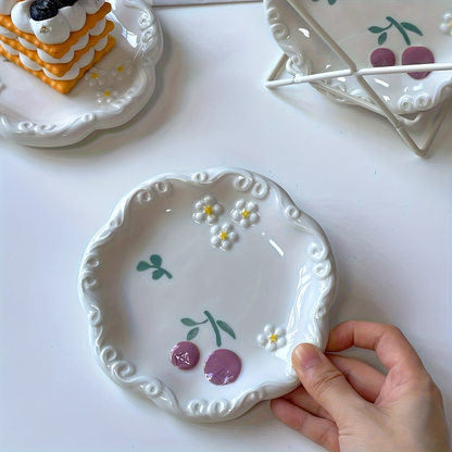 Two-piece ceramic embossed plate set