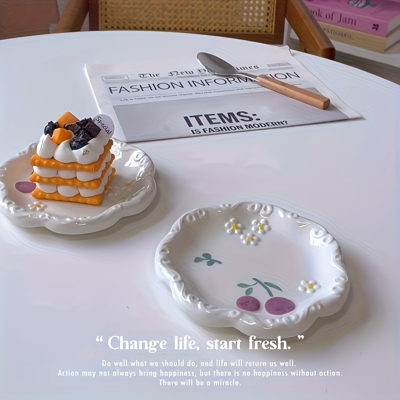 Two-piece ceramic embossed plate set