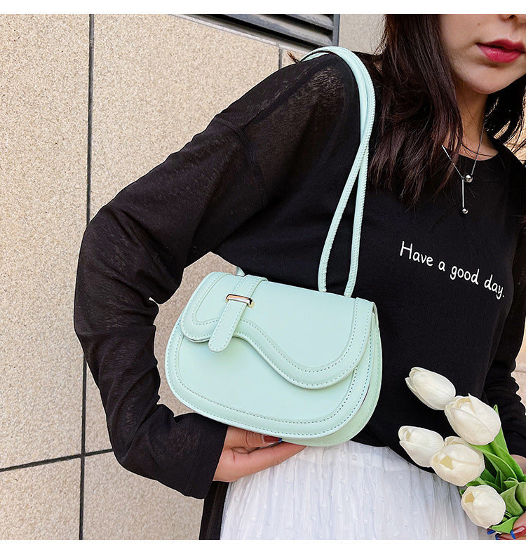 The original design saddle bag single shoulder messenger bag female fresh small bag simple fashion handbag
