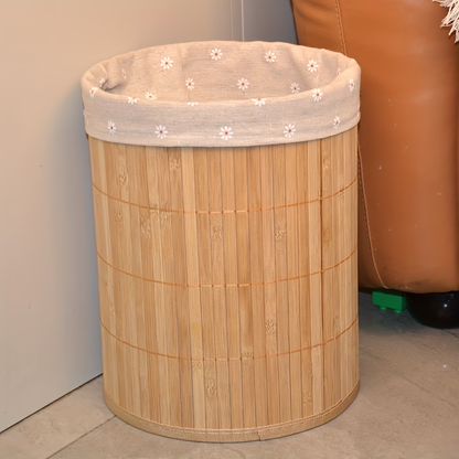 A rustic-style trash can, made of bamboo, with a minimalist design.