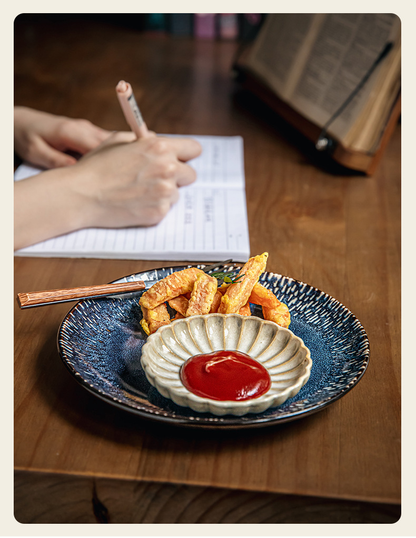 Two square yellow retro-style petal-shaped condiment dishes